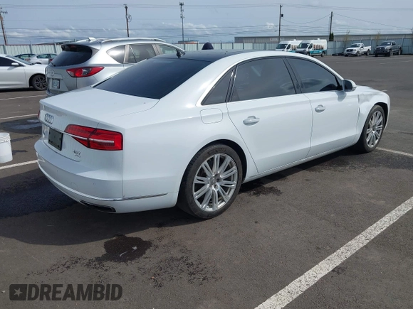 2015 Audi A8 4.0T with VIN WAU32AFD6FN039739, listed as a IAAI auction lot 41946401 with 102,668 mi miles and . Bid and sale history available at DreamBid. Image 4.