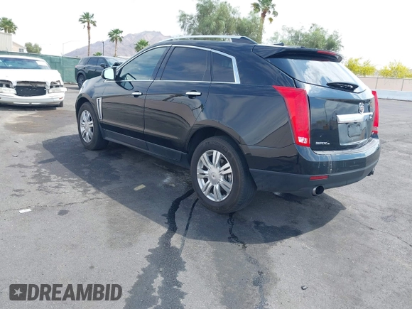 2014 Cadillac SRX Luxury Collection z VIN 3GYFNEE30ES650372, wystawiony jako IAAI lot #42195783 z przebiegiem 169 113 mil mil oraz . Historia ofert i sprzedaży dostępna na DreamBid. Obrazek 3.