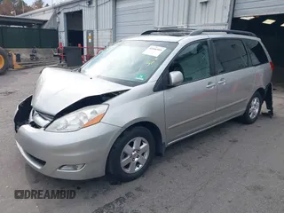 2008 Toyota Sienna XLE with VIN 5TDZK22C38S151671, listed as a IAAI auction lot 41046569 with 119,239 mi miles. Bid and sale history available at carsss.com. Image 2.