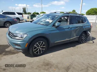 2021 Volkswagen Tiguan SE z VIN 3VV3B7AX6MM041166, wystawiony jako Copart lot #57769445 z przebiegiem 51 030 mil mil oraz Nie do naprawy • Non repairable. Historia ofert i sprzedaży dostępna na DreamBid. Obrazek 1.
