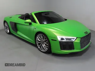2017 Audi R8 z VIN WUAVACFX5H7903923, wystawiony jako Copart lot #52993935 z przebiegiem 53 883 mil mil oraz Szkody całkowita. Historia ofert i sprzedaży dostępna na DreamBid. Obrazek 1.