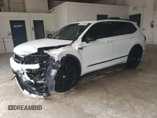 2021 Volkswagen Tiguan SE z VIN 3VV3B7AX5MM001502, wystawiony jako Copart lot #59669575 z przebiegiem 103 030 mil mil oraz Czysty tytuł • Clean title. Historia ofert i sprzedaży dostępna na DreamBid. Obrazek 1.