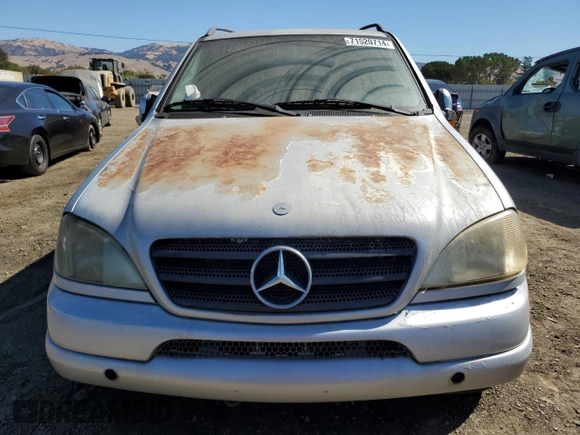 2000 Mercedes-Benz M 320/430/500 with VIN 4JGAB72E5YA173269, listed as a Copart auction lot 71520714 with 239,248 mi miles and Clean title. Bid and sale history available at DreamBid. Image 5.