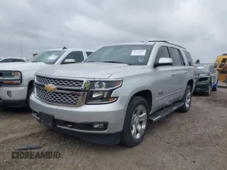 2019 Chevrolet Tahoe LT z VIN 1GNSCBKC1KR191789, wystawiony jako IAAI lot #42144961 z przebiegiem 94 178 mil mil oraz . Historia ofert i sprzedaży dostępna na DreamBid. Obrazek 19.
