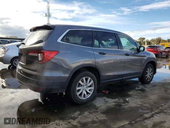 2019 Honda Pilot LX with VIN 5FNYF5H10KB026033, listed as a Copart auction lot 82578984 with 87,602 mi miles and Salvage Title. Bid and sale history available at DreamBid. Image 3.
