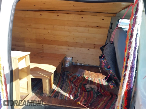 2003 Ford Econoline Cargo with VIN 1FTRE14223HB81747, listed as a IAAI auction lot 41691621 with 132,844 mi miles and . Bid and sale history available at DreamBid. Image 8.