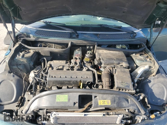 2004 MINI Hardtop with VIN WMWRC334X4TJ61391, listed as a Copart auction lot 53735615 with 103,974 mi miles and Salvage Title. Bid and sale history available at DreamBid. Image 11.