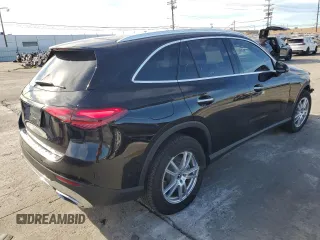 2023 Mercedes-Benz GLC with VIN W1NKM4GB4PU017214, listed as a Copart auction lot 87627235 with 8,678 mi miles and Salvage Title. Bid and sale history available at carsss.com. Image 3.