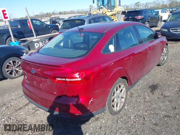 2015 Ford Focus SE with VIN 1FADP3F27FL381463, listed as a IAAI auction lot 41778792 with 999,999 mi miles. Bid and sale history available at carsss.com. Image 4.