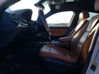 2018 BMW X4 xDrive28i with VIN 5UXXW3C50J0T82911, listed as a Copart auction lot 73635783 with 95,012 mi miles. Bid and sale history available at carsss.com. Image 7.