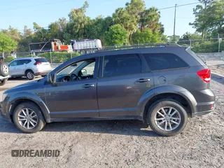 2015 Dodge Journey SXT with VIN 3C4PDCBG8FT707650, listed as a IAAI auction lot 41937738 with 217,318 mi miles and . Bid and sale history available at DreamBid. Image 14.