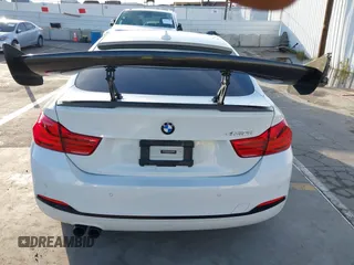 2018 BMW 4 Series 430i with VIN WBA4J1C59JBG77470, listed as a IAAI auction lot 41534689 with 141,710 mi miles and . Bid and sale history available at carsss.com. Image 16.