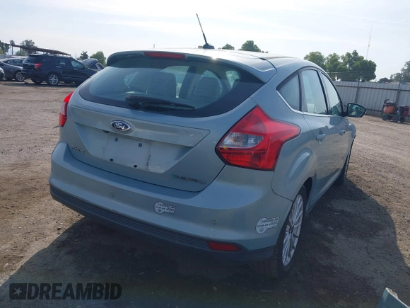 2014 Ford Focus Electric z VIN 1FADP3R41EL238035, wystawiony jako IAAI lot #41975546 z przebiegiem 72 873 mil mil oraz . Historia ofert i sprzedaży dostępna na DreamBid. Obrazek 4.