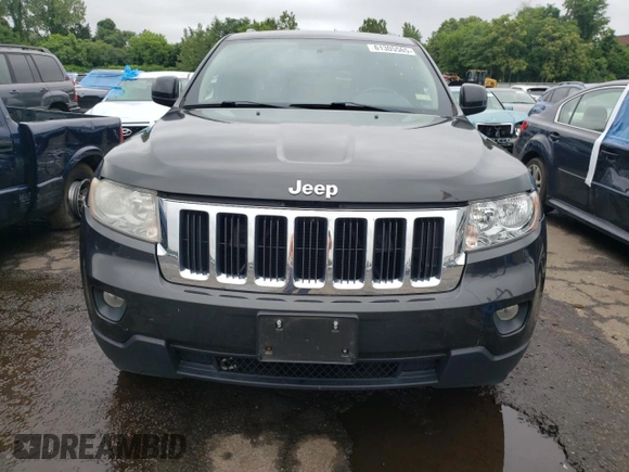2011 Jeep Grand Cherokee Laredo with VIN 1J4RR4GG1BC737808, listed as a Copart auction lot 61305565 with 188,067 mi miles and Clean title. Bid and sale history available at DreamBid. Image 5.