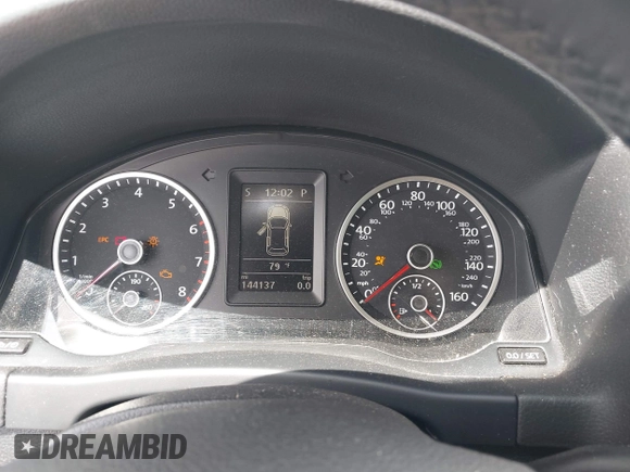 2014 Volkswagen Tiguan S with VIN WVGBV3AX0EW589381, listed as a IAAI auction lot 42186999 with 144,137 mi miles and . Bid and sale history available at DreamBid. Image 7.