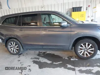 2021 Honda Pilot EX-L with VIN 5FNYF6H56MB037761, listed as a IAAI auction lot 41154468 with 61,159 mi miles. Bid and sale history available at carsss.com. Image 13.
