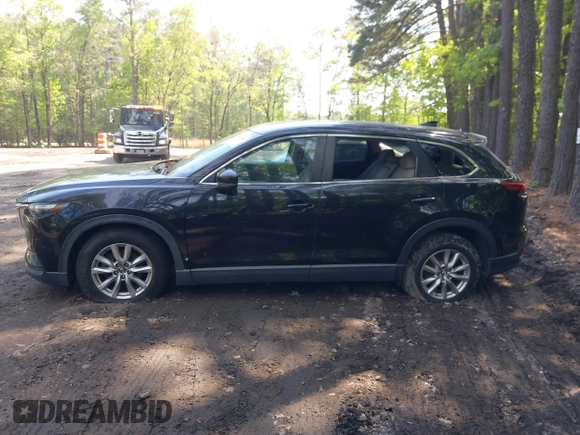 2016 Mazda CX-9 Sport with VIN JM3TCABY8G0112981, listed as a IAAI auction lot 42093389 with 106,384 mi miles. Bid and sale history available at carsss.com. Image 14.
