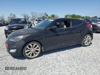 2013 Hyundai Veloster w/Black Int with VIN KMHTC6AD6DU107525, listed as a Copart auction lot 49805555 with 135,640 mi miles and Clean Title. Bid and sale history available at carsss.com. Image 1.