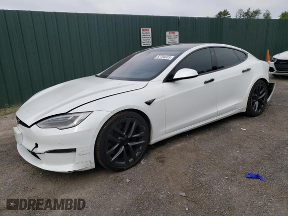 2021 Tesla Model S Long Range z VIN 5YJSA1E59MF438359, wystawiony jako Copart lot #57794325 z przebiegiem 31 651 mil mil oraz Szkoda całkowita • Salvage title. Historia ofert i sprzedaży dostępna na DreamBid. Obrazek 1.