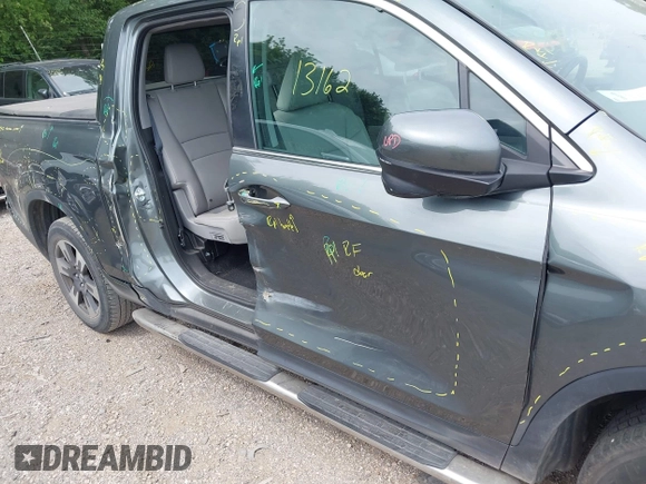 2018 Honda Ridgeline RTL-T with VIN 5FPYK3F61JB013733, listed as a IAAI auction lot 42548122 with 92,407 mi miles and . Bid and sale history available at DreamBid. Image 18.
