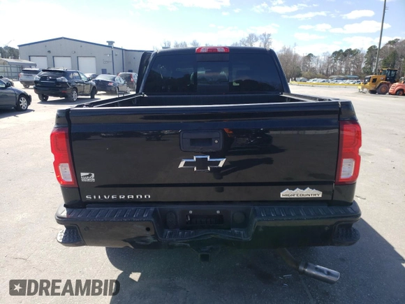 2018 Chevrolet Silverado 1500 High Country with VIN 3GCUKTEJ9JG131407, listed as a Copart auction lot 47297505 with 69,196 mi miles and Salvage Title. Bid and sale history available at DreamBid. Image 6.