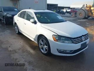 2014 Volkswagen Passat SEL Premium z VIN 1VWCN7A31EC072084, wystawiony jako IAAI lot #41726337 z przebiegiem 175 612 mil mil oraz . Historia ofert i sprzedaży dostępna na DreamBid. Obrazek 1.