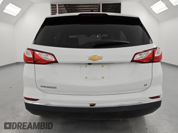 2018 Chevrolet Equinox LT z VIN 3GNAXJEV2JL400650, wystawiony jako Copart lot #55626365 z przebiegiem 117 424 mil mil oraz Czysty tytuł • Clean title. Historia ofert i sprzedaży dostępna na DreamBid. Obrazek 6.