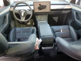 2023 Tesla Model Y Long Range z VIN 7SAYGDEE7PA199067, wystawiony jako Copart lot #52463215 z przebiegiem 30 978 mil mil oraz Szkoda całkowita • Salvage title. Historia ofert i sprzedaży dostępna na DreamBid. Obrazek 8.