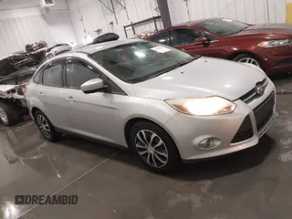 2012 Ford Focus SE with VIN 1FAHP3F24CL217049, listed as a IAAI auction lot 41825450 with 86,573 mi miles. Bid and sale history available at carsss.com. Image 1.
