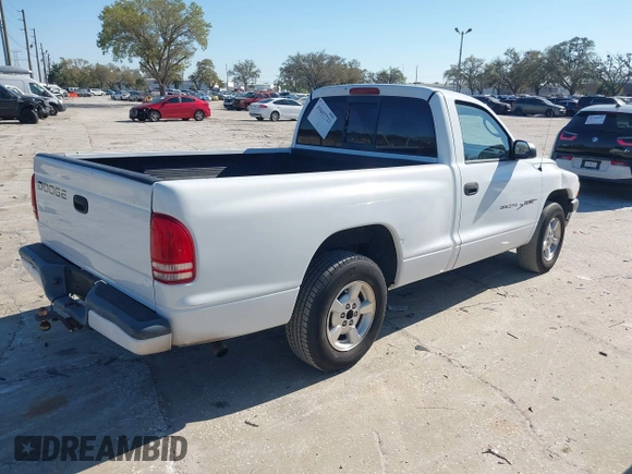 2001 Dodge Dakota with VIN 1B7FL26X71S161985, listed as a IAAI auction lot 41697721 with 218,168 mi miles. Bid and sale history available at carsss.com. Image 4.