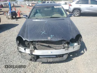 2009 Mercedes-Benz CLK 350 with VIN WDBTJ56H99F261060, listed as a Copart auction lot 69812004 with 105,218 mi miles and Salvage Title. Bid and sale history available at carsss.com. Image 5.