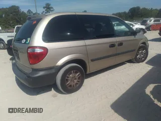 2005 Dodge Caravan SE with VIN 1D4GP25B25B410300, listed as a IAAI auction lot 42117541 with 34,596 mi miles and . Bid and sale history available at DreamBid. Image 4.