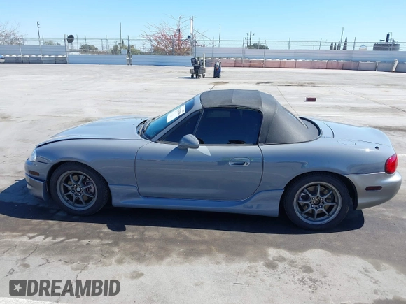 2003 Mazda MX-5 Miata Cloth with VIN JM1NB353930309670, listed as a IAAI auction lot 42234586 with 220,979 mi miles and . Bid and sale history available at DreamBid. Image 14.