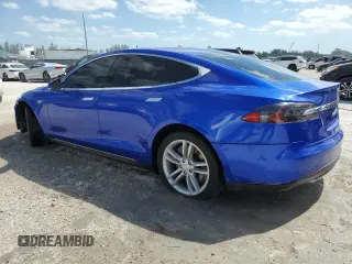 2014 Tesla Model S 60 with VIN 5YJSA1S14EFP44162, listed as a Copart auction lot 52943025 with Not Provided miles and Salvage Title. Bid and sale history available at DreamBid. Image 2.