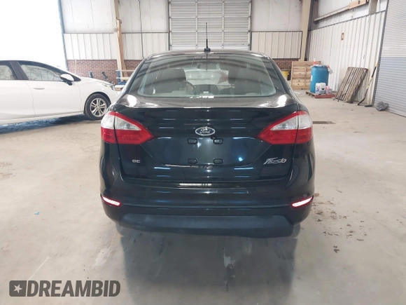 2018 Ford Fiesta SE z VIN 3FADP4BJ3JM141658, wystawiony jako IAAI lot #41737201 z przebiegiem 92 078 mil mil oraz . Historia ofert i sprzedaży dostępna na DreamBid. Obrazek 16.