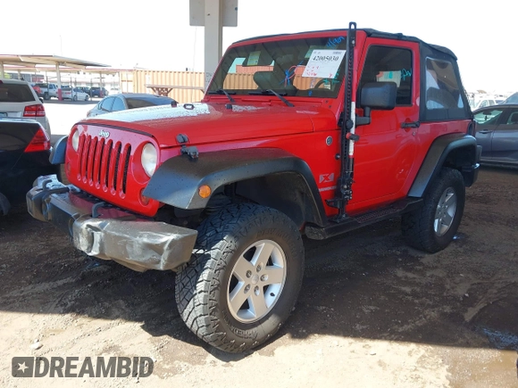 2009 Jeep Wrangler X with VIN 1J4FA24179L750393, listed as a IAAI auction lot 42005030 with 179,746 mi miles and . Bid and sale history available at DreamBid. Image 2.