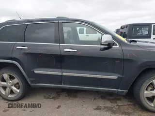 2011 Jeep Grand Cherokee Overland with VIN 1J4RS6GT7BC518123, listed as a IAAI auction lot 41277374 with 163,752 mi miles and . Bid and sale history available at DreamBid. Image 13.