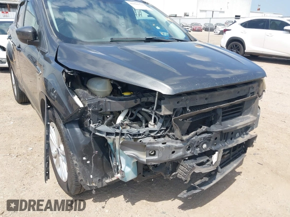 2017 Ford Escape SE z VIN 1FMCU0GD1HUE71410, wystawiony jako IAAI lot #42026516 z przebiegiem 173 804 mil mil oraz . Historia ofert i sprzedaży dostępna na DreamBid. Obrazek 6.