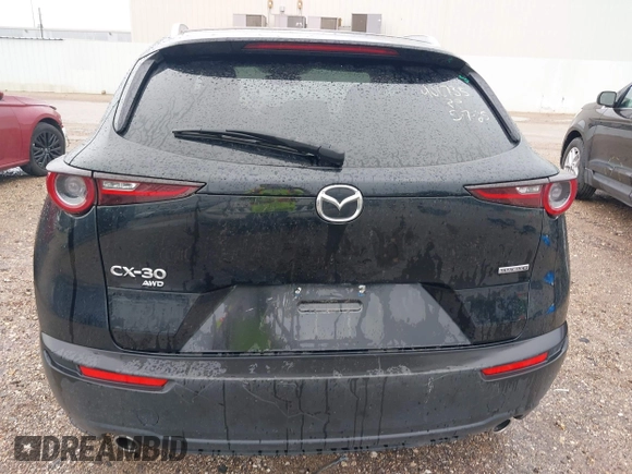 2024 Mazda CX-30 S Select Sport with VIN 3MVDMBBM3RM700797, listed as a IAAI auction lot 42686898 with 23,170 mi miles and . Bid and sale history available at DreamBid. Image 16.