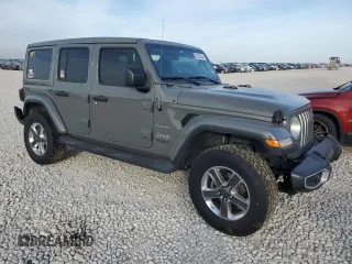 2020 Jeep Wrangler Unlimited Sahara Altitude with VIN 1C4HJXEG2LW206453, listed as a Copart auction lot 82303434 with 51,559 mi miles and Salvage title. Bid and sale history available at DreamBid. Image 4.