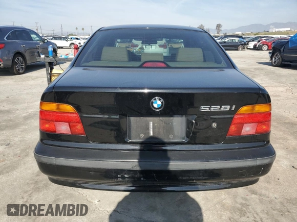 2000 BMW 5 Series 528iA with VIN WBADM6349YGU04874, listed as a Copart auction lot 45578875 with 89,674 mi miles and Salvage Title. Bid and sale history available at carsss.com. Image 6.