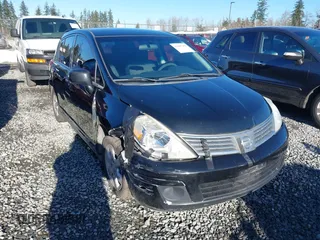 2009 Nissan Versa 1.8 SL with VIN 3N1BC13E59L406937, listed as a IAAI auction lot 41387158 with 149,234 mi miles. Bid and sale history available at carsss.com. Image 1.