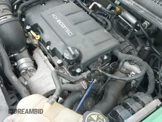 2018 Chevrolet Sonic Premier z VIN 1G1JF5SB4J4133703, wystawiony jako IAAI lot #42275127 z przebiegiem 116 298 mil mil oraz . Historia ofert i sprzedaży dostępna na DreamBid. Obrazek 19.