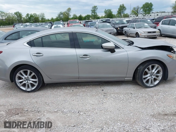 2014 Mazda 6 i Touring with VIN JM1GJ1T51E1106970, listed as a IAAI auction lot 42027350 with 113,756 mi miles and . Bid and sale history available at DreamBid. Image 13.