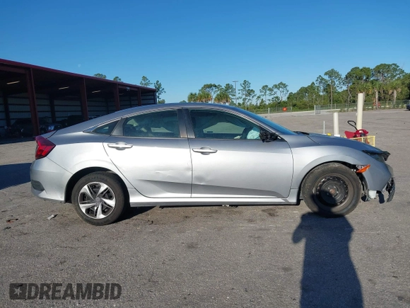 2020 Honda Civic LX with VIN 19XFC2F63LE004953, listed as a IAAI auction lot 41824922 with 71,458 mi miles and . Bid and sale history available at DreamBid. Image 13.