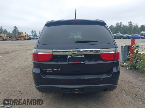 2013 Dodge Durango SXT with VIN 1C4RDJAG5DC697022, listed as a IAAI auction lot 42474060 with 159,723 mi miles and . Bid and sale history available at DreamBid. Image 16.
