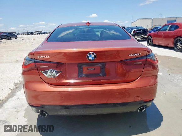 2021 BMW 4 Series 430i with VIN WBA53AP0XMCH23674, listed as a Copart auction lot 59490125 with 66,940 mi miles and Salvage title. Bid and sale history available at DreamBid. Image 6.