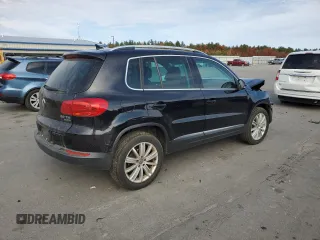 2013 Volkswagen Tiguan SE z VIN WVGBV7AXXDW534779, wystawiony jako Copart lot #77397164 z przebiegiem 149 285 mil mil oraz Szkoda całkowita • Salvage title. Historia ofert i sprzedaży dostępna na DreamBid. Obrazek 3.