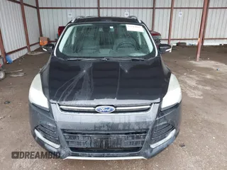 2014 Ford Escape Titanium z VIN 1FMCU0J96EUA84108, wystawiony jako IAAI lot #42114002 z przebiegiem 176 735 mil mil oraz . Historia ofert i sprzedaży dostępna na DreamBid. Obrazek 12.