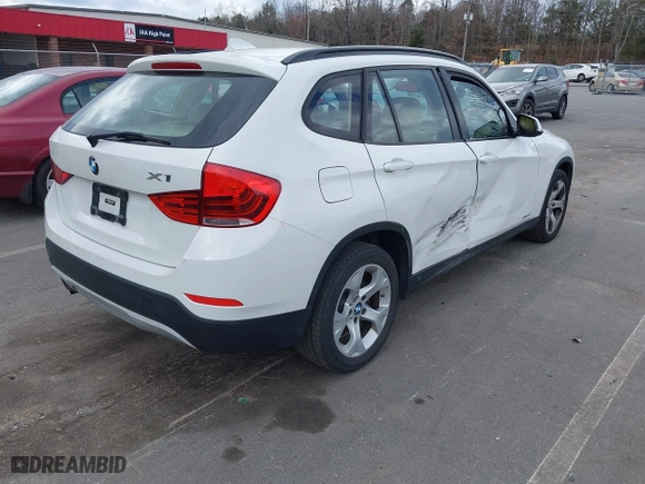 2015 BMW X1 sDrive28i with VIN WBAVM1C50FV314957, listed as a IAAI auction lot 41816402 with 148,410 mi miles. Bid and sale history available at carsss.com. Image 4.